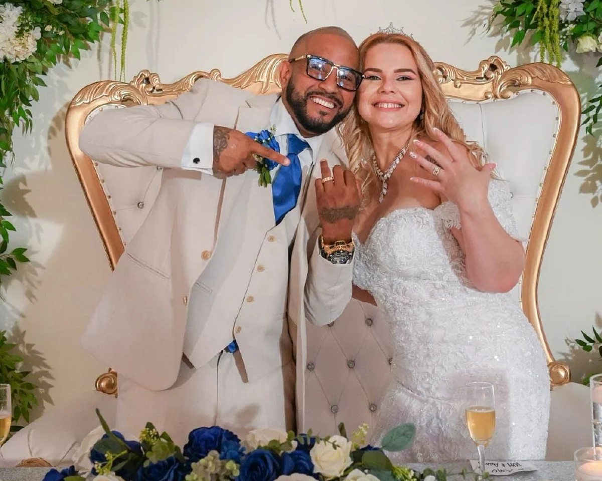 Newlyweds showing their rings at Nencini Ballroom