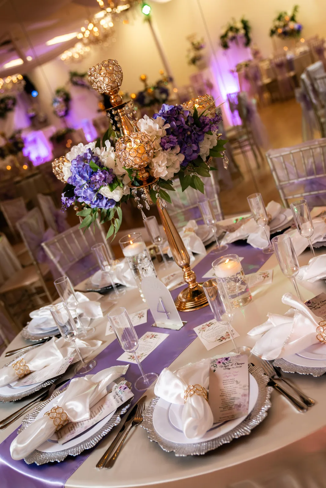 Lavender, ivory, and gold wedding tablescape at Nencini Ballroom