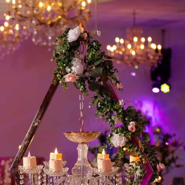 Styled chandelier and candle detail from Nencini Ballroom Instagram feed