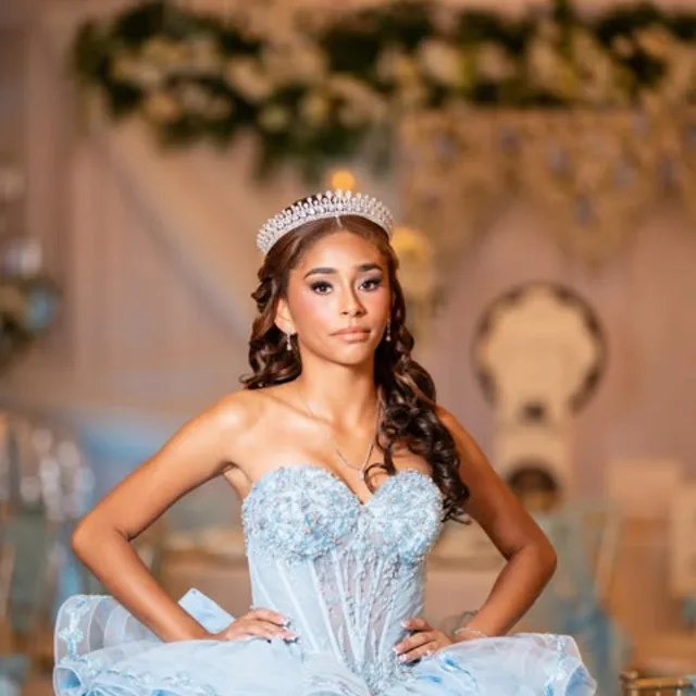 Quinceañera in a light-blue gown at Nencini Ballroom