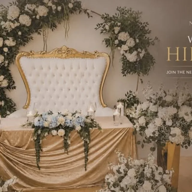Floral ballroom stage with gold throne chair